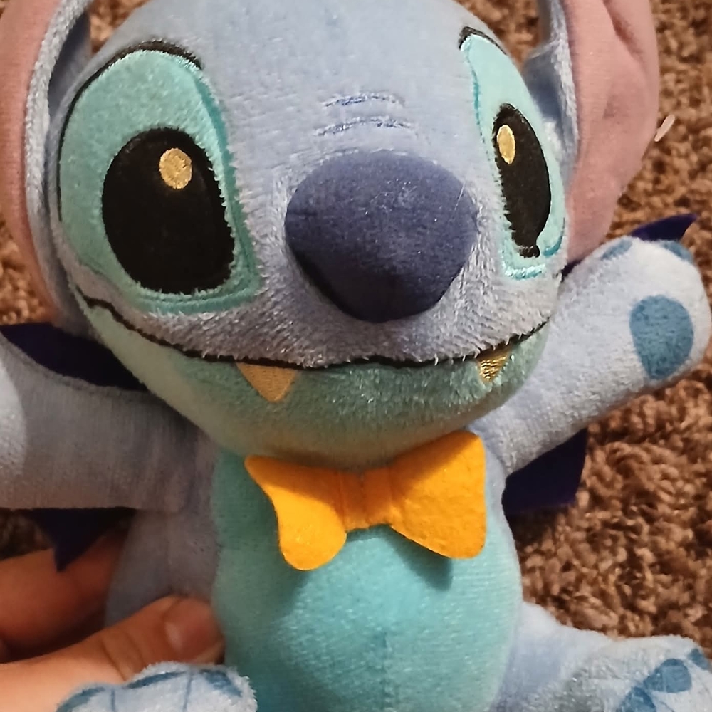 Blue Plush Toy with Yellow Bow